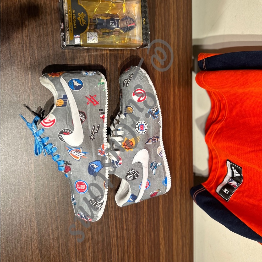 Gray Sneakers with Sports Logos and Blue Laces